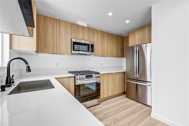 Interior, Kitchen, Recessed Lighting, Stainless Steel Appliances, Wood Texture Flooring