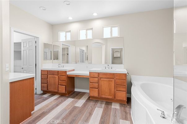Bathroom, Dual Sink Vanities, Interior, Recessed Lighting, Wood Texture Flooring