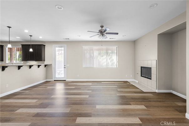 Empty room, Fireplace, Interior, Pendant Lights, Recessed Lighting, Wood Texture Flooring