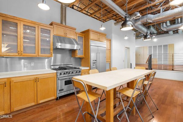 Dining room, Interior, Kitchen, Pendant Lights, Stainless Steel Appliances, Wood Texture Flooring