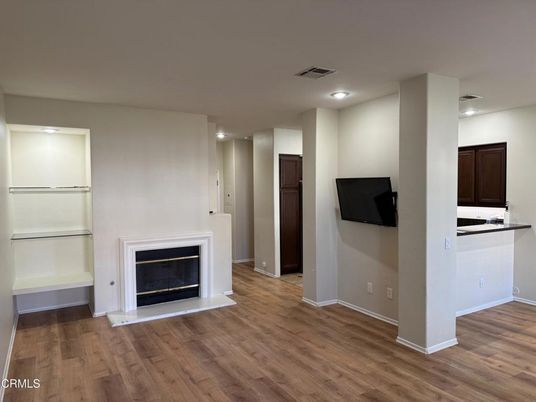 Empty room, Fireplace, Interior, Recessed Lighting, Wood Texture Flooring