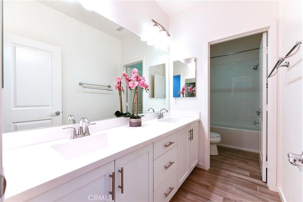 Bathroom, Dual Sink Vanities, Glass Shower, Interior, Wood Texture Flooring