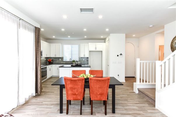 Dining room, Interior, Kitchen, Recessed Lighting, Stainless Steel Appliances, Wood Texture Flooring