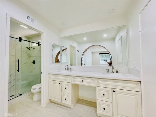 Bathroom, Dual Sink Vanities, Glass Shower, Interior, Marble Walls, Recessed Lighting