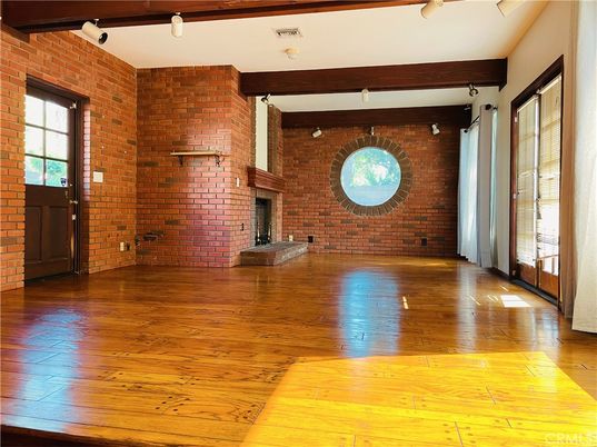 Empty room, Fireplace, Interior, Stone Walls, Wooden Beams, Wood Texture Flooring