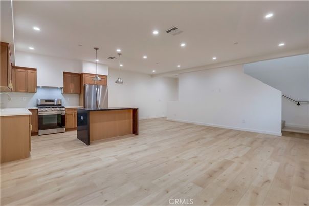 Interior, Kitchen, Pendant Lights, Recessed Lighting, Stainless Steel Appliances, Wood Texture Flooring