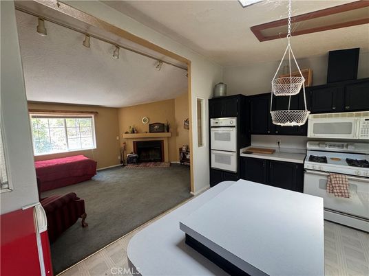 Fireplace, Interior, Kitchen, Pendant Lights, Wood Texture Flooring