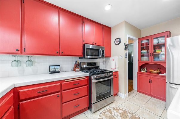 Interior, Kitchen, Recessed Lighting, Stainless Steel Appliances, Tile Countertops