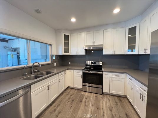 Interior, Kitchen, Recessed Lighting, Stainless Steel Appliances, Wood Texture Flooring