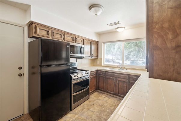 Interior, Kitchen, Stainless Steel Appliances, Tile Countertops