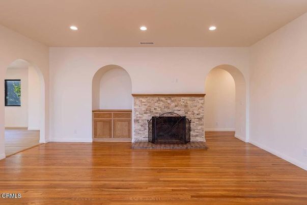 Empty room, Fireplace, Interior, Recessed Lighting, Wood Texture Flooring