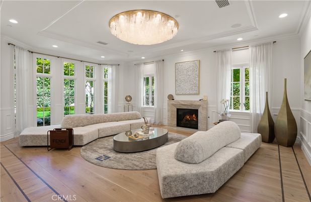 Chandelier, Fireplace, Interior, Living room, Recessed Lighting, Wood Texture Flooring