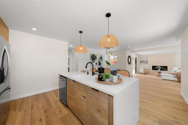 Dining room, Fireplace, Interior, Kitchen, Living room, Pendant Lights, Recessed Lighting, Stainless Steel Appliances, Wood Texture Flooring