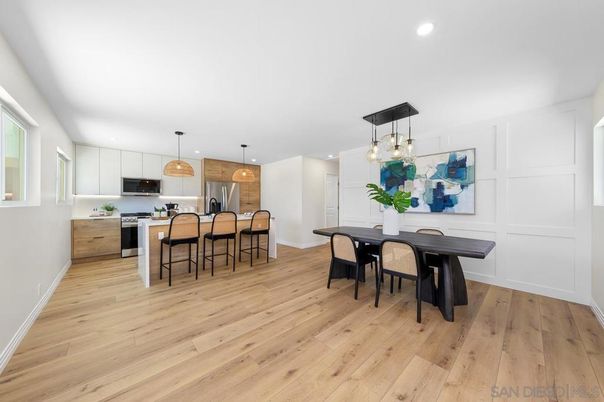 Dining room, Interior, Kitchen, Pendant Lights, Recessed Lighting, Stainless Steel Appliances, Wood Texture Flooring