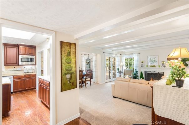 Dining room, Fireplace, Interior, Kitchen, Living room, Stainless Steel Appliances, Wood Texture Flooring