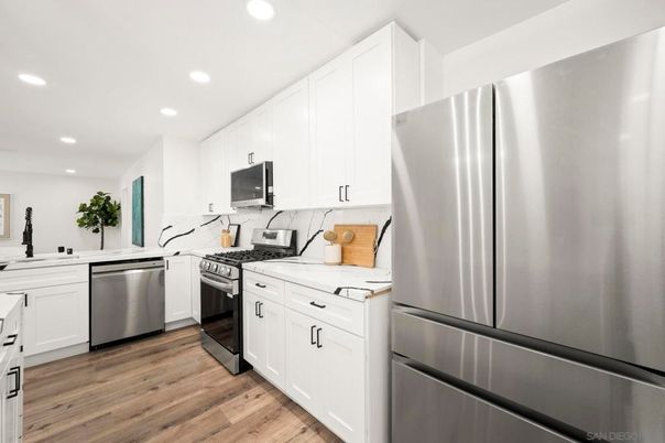 Interior, Kitchen, Recessed Lighting, Stainless Steel Appliances, Wood Texture Flooring