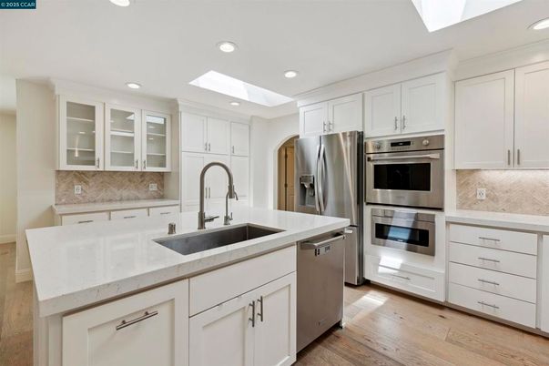 Interior, Kitchen, Recessed Lighting, Stainless Steel Appliances, Wood Texture Flooring