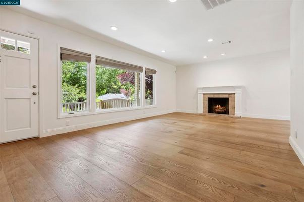 Empty room, Fireplace, Interior, Recessed Lighting, Wood Texture Flooring