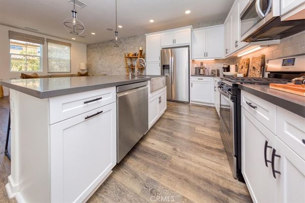 Interior, Kitchen, Pendant Lights, Recessed Lighting, Stainless Steel Appliances, Wood Texture Flooring