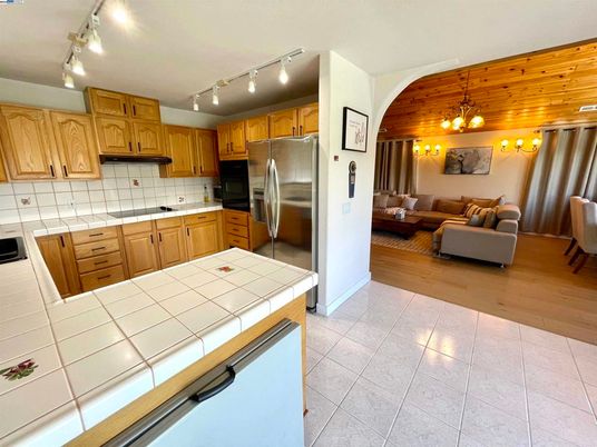 Interior, Kitchen, Living room, Pendant Lights, Stainless Steel Appliances, Tile Countertops, Wood Texture Flooring