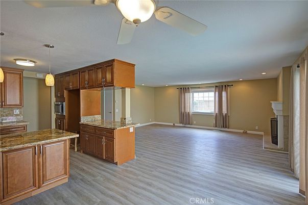 Fireplace, Interior, Kitchen, Pendant Lights, Recessed Lighting, Wood Texture Flooring
