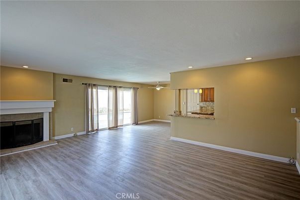 Empty room, Fireplace, Interior, Recessed Lighting, Wood Texture Flooring