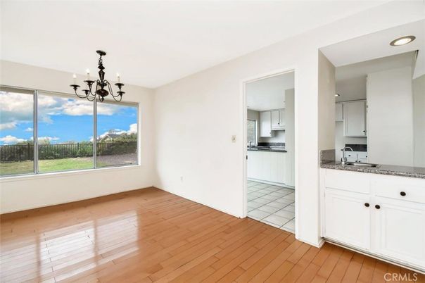 Chandelier, Empty room, Interior, Kitchen, Recessed Lighting, Wood Texture Flooring