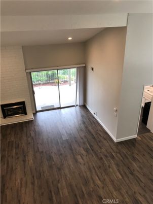 Empty room, Fireplace, Interior, Recessed Lighting, Wood Texture Flooring