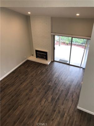 Empty room, Fireplace, Interior, Recessed Lighting, Wood Texture Flooring