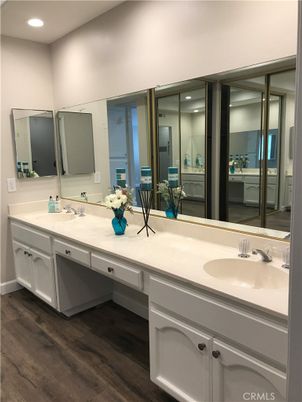 Bathroom, Dual Sink Vanities, Interior, Recessed Lighting, Wood Texture Flooring