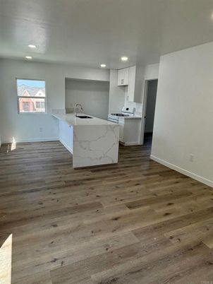 Interior, Kitchen, Marble Walls, Recessed Lighting, Wood Texture Flooring