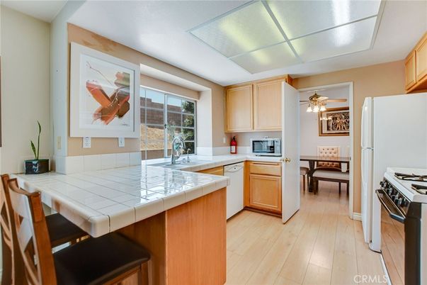 Dining room, Interior, Kitchen, Tile Countertops, Wood Texture Flooring