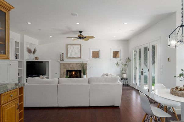 Dining room, Fireplace, Interior, Living room, Pendant Lights, Recessed Lighting, Wood Texture Flooring
