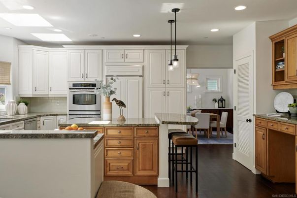 Dining room, Interior, Kitchen, Pendant Lights, Recessed Lighting, Stainless Steel Appliances, Wood Texture Flooring