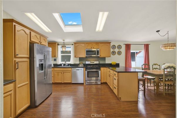 Dining room, Interior, Kitchen, Pendant Lights, Stainless Steel Appliances, Wood Texture Flooring