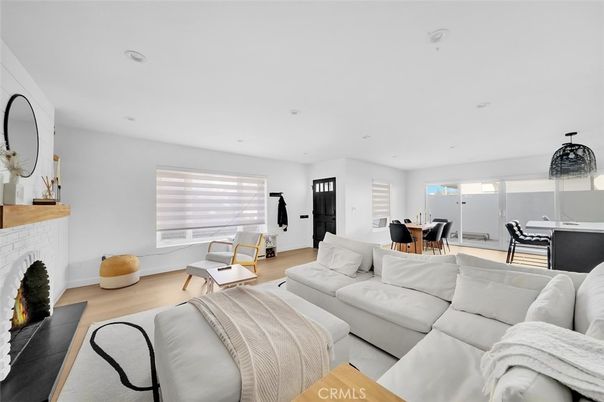 Dining room, Fireplace, Interior, Living room, Recessed Lighting, Wood Texture Flooring