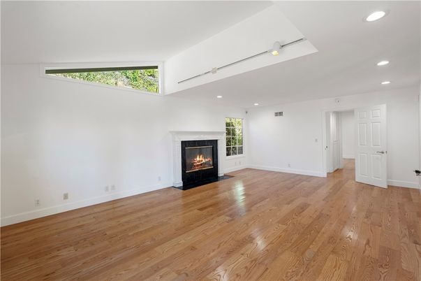 Empty room, Fireplace, Interior, Recessed Lighting, Wood Texture Flooring