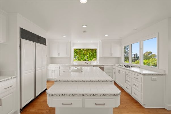 Interior, Kitchen, Recessed Lighting, Tile Countertops, Wood Texture Flooring