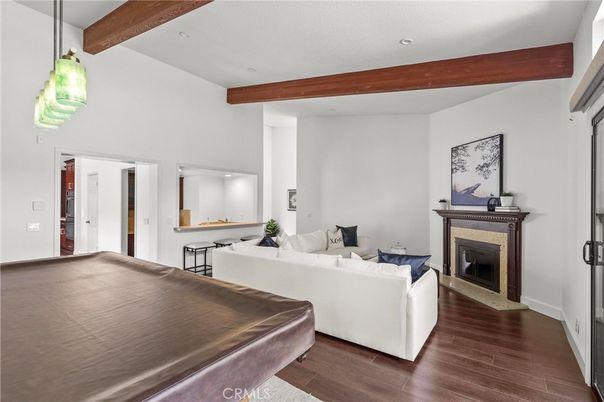Fireplace, Interior, Living room, Pendant Lights, Recessed Lighting, Wooden Beams, Wood Texture Flooring