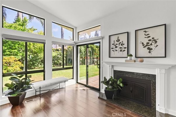 Fireplace, Interior, Sun Room, Wood Texture Flooring
