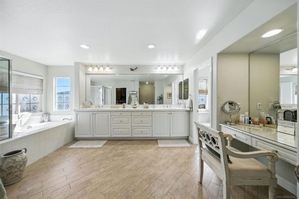 Bathroom, Dual Sink Vanities, Interior, Recessed Lighting, Wood Texture Flooring