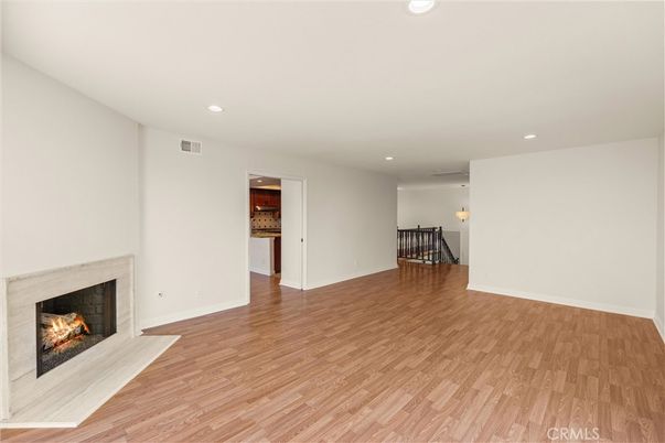 Empty room, Fireplace, Interior, Recessed Lighting, Wood Texture Flooring