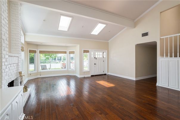 Empty room, Fireplace, Interior, Recessed Lighting, Stone Walls, Wood Texture Flooring