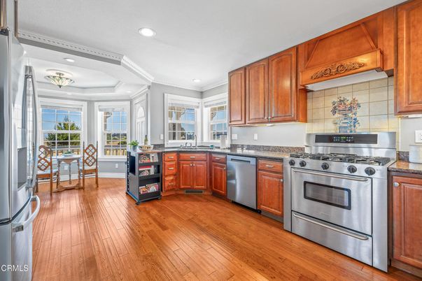 Dining room, Interior, Kitchen, Recessed Lighting, Stainless Steel Appliances, Wood Texture Flooring
