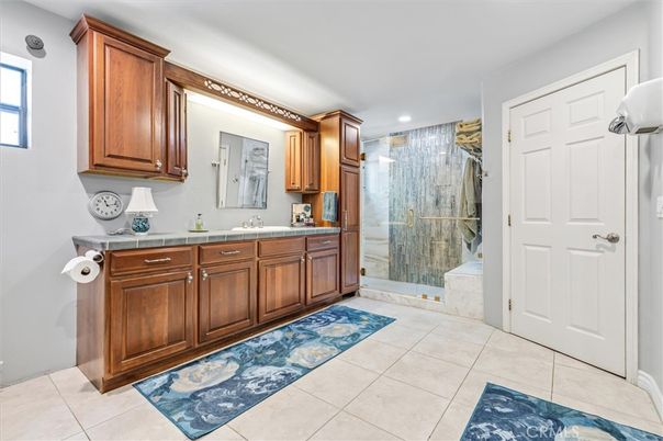 Bathroom, Dual Sink Vanities, Glass Shower, Interior, Recessed Lighting, Tile Countertops