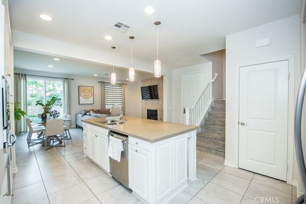 Dining room, Fireplace, Interior, Kitchen, Pendant Lights, Recessed Lighting, Stainless Steel Appliances