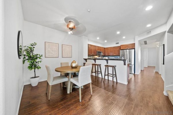 Dining room, Interior, Kitchen, Recessed Lighting, Stainless Steel Appliances, Wood Texture Flooring