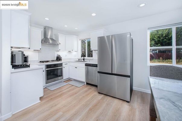 Interior, Kitchen, Recessed Lighting, Stainless Steel Appliances, Wood Texture Flooring