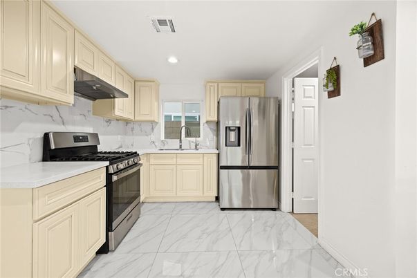 Interior, Kitchen, Marble, Marble Walls, Recessed Lighting, Stainless Steel Appliances