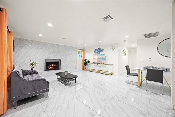 Dining room, Fireplace, Interior, Living room, Marble, Marble Walls, Recessed Lighting